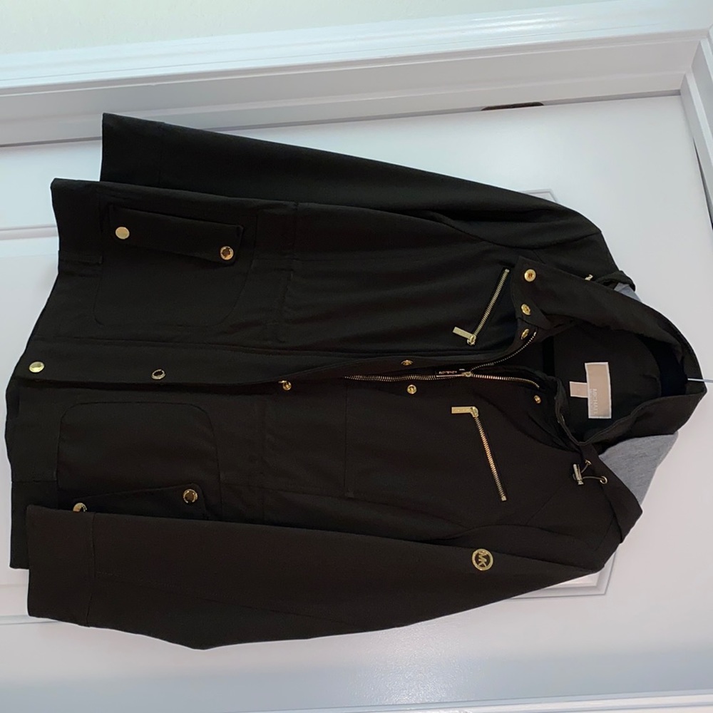 Army green hard shell Michael Kors rain jacket